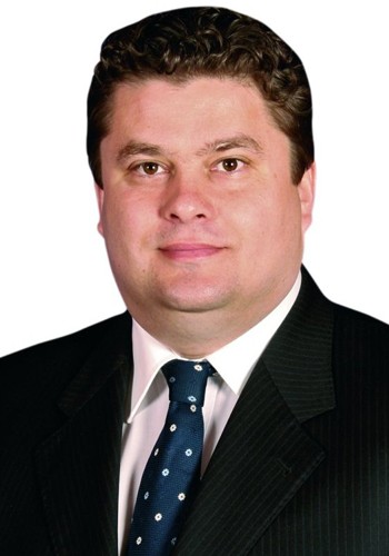 Florin Popescu în calitate d epresedinte de CJ a semnat contracte cu firma la care era asociat