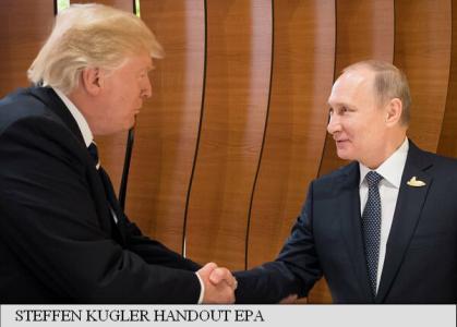 Prima strângere de mână Trump - Putin